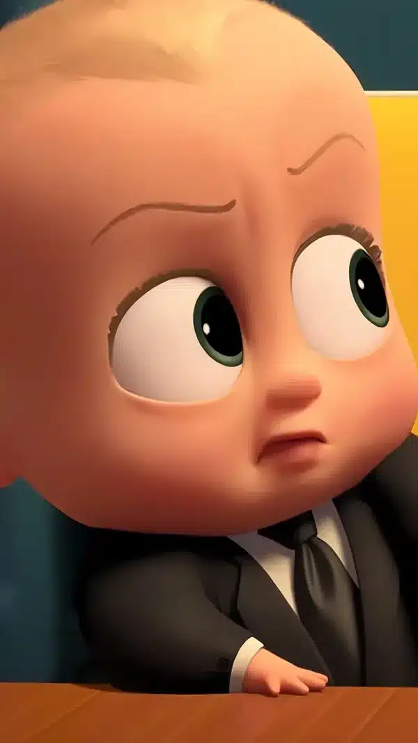 تصویر زمینه بچه رئیس با حالت چهره بامزه و خندان