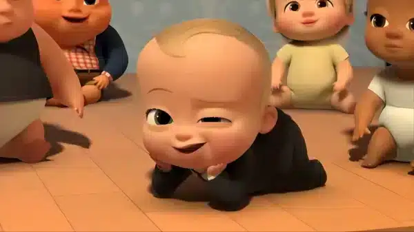 تصویر زمینه بچه رئیس با حالت چهره بامزه و خندان